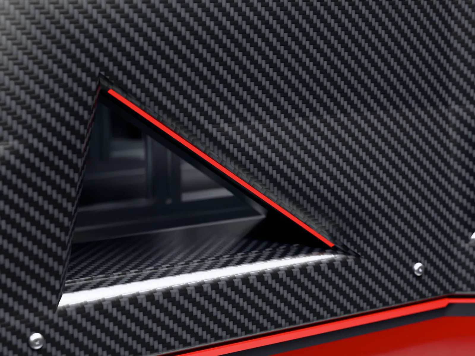 The carbon monocoque side panel, its 2×2 twill weave catching the light